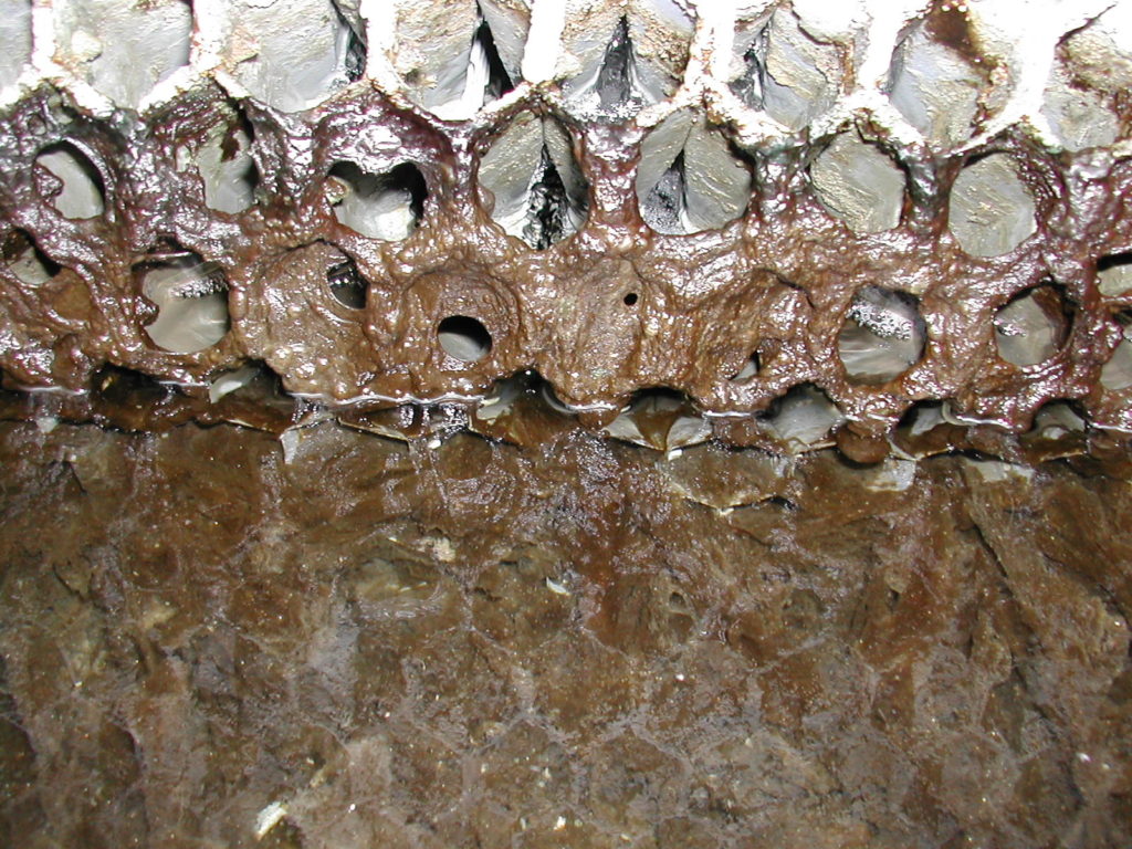 Dramatic Build-Up of Slime & Sludge in the Fill & Basin of a Cooling Tower